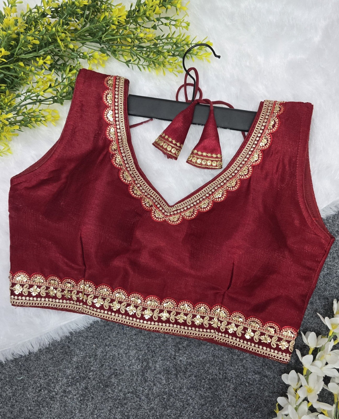 Women wear Sleeveless V neck Embroidered Stitched blouse